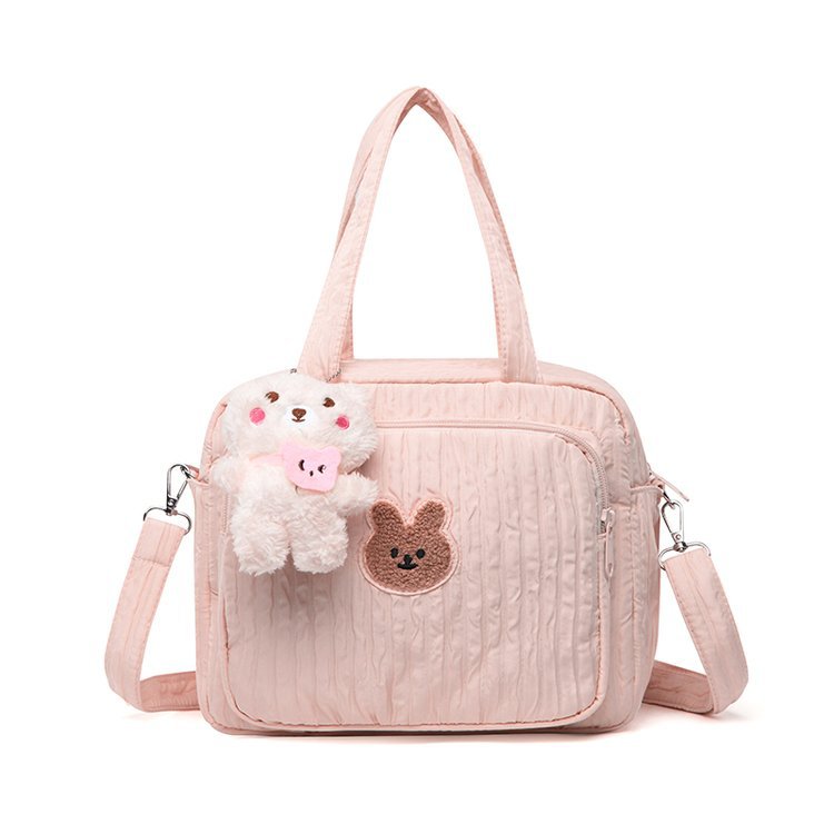 sac-pour_bebe-avec-pendentif-couleur-rose